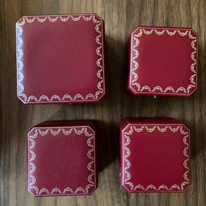 Four authentic Cartier ring boxes